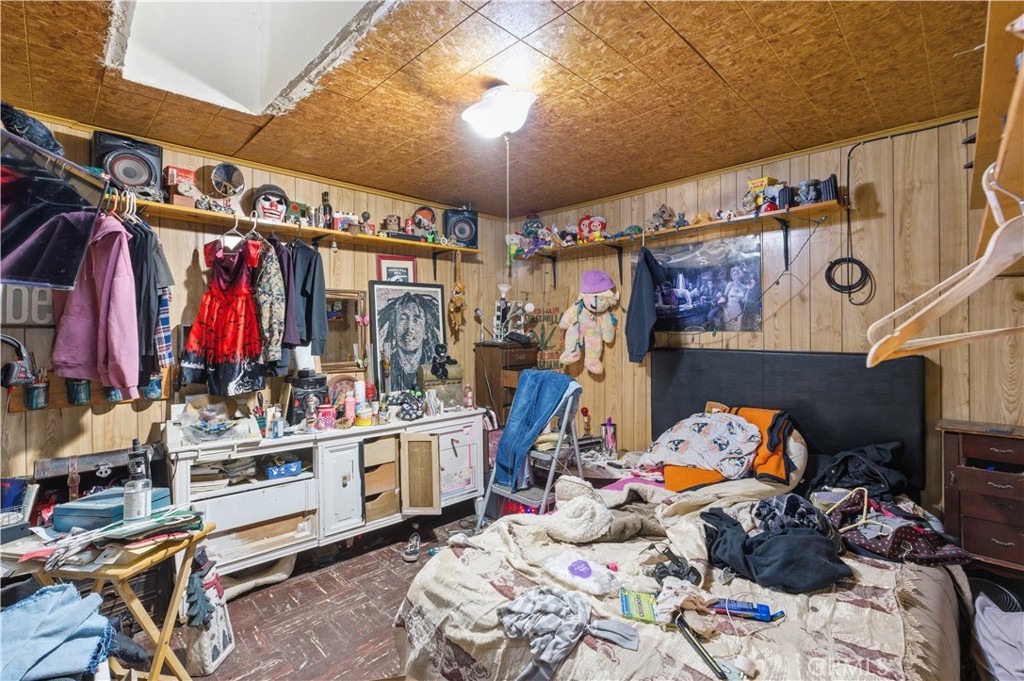 32787 Jagadon Road Lucerne Valley, CA 92356 - Photo 16 of 32 a view of walk in closet with clothes and shoes