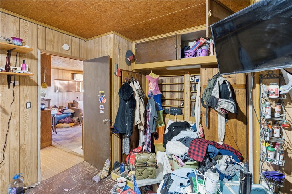 32787 Jagadon Road Lucerne Valley, CA 92356 - Photo 17 of 32 a view of walk in closet with clothes and shoes