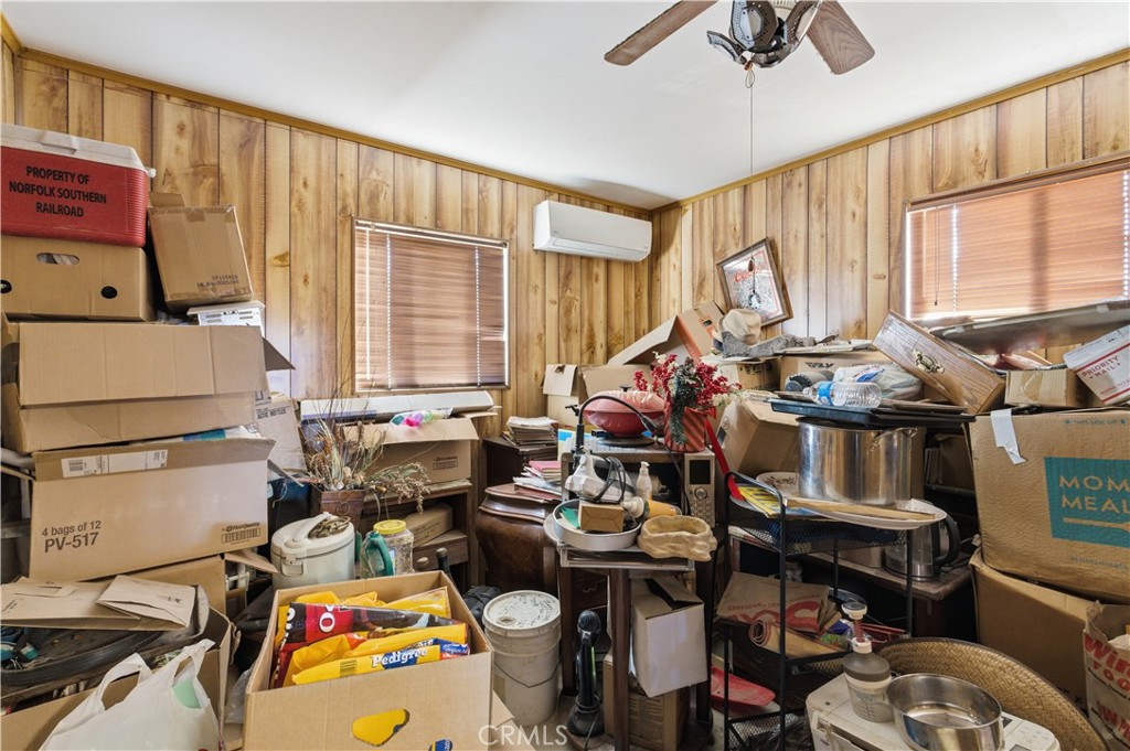 32787 Jagadon Road Lucerne Valley, CA 92356 - Photo 18 of 32 a storage room with furniture and a window