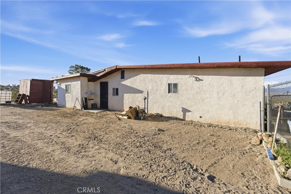 32787 Jagadon Road Lucerne Valley, CA 92356 - Photo 24 of 32 a view of a house with a snow in the background