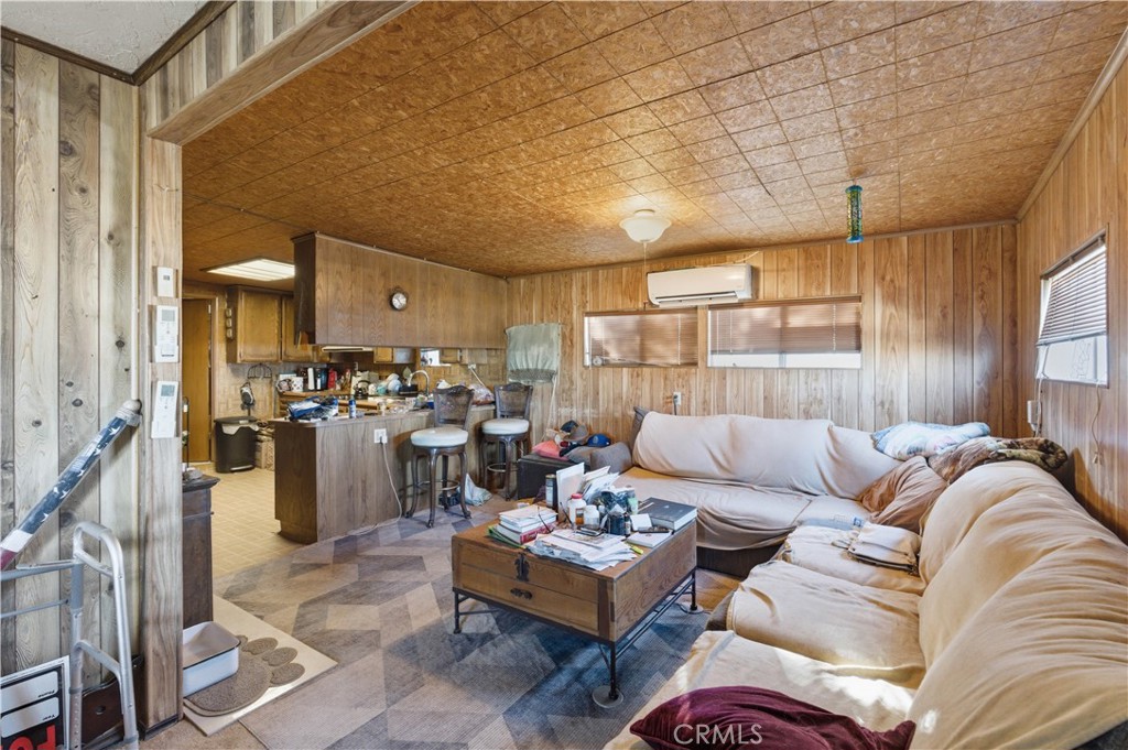 32787 Jagadon Road Lucerne Valley, CA 92356 - Photo 4 of 32 a living room with furniture and a large window