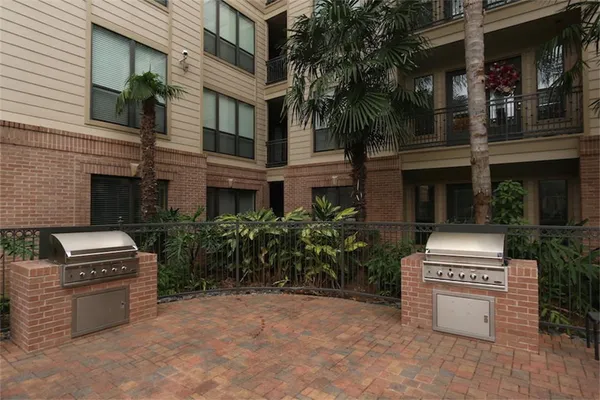 a view of dinning table and chairs in patio