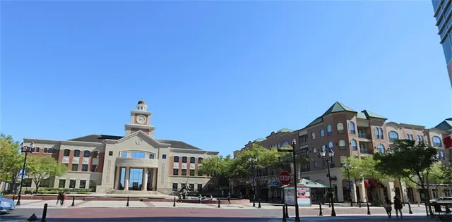 a view of a building with a yard