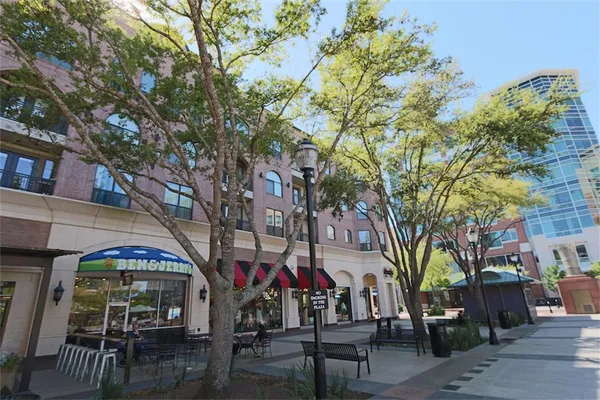 a view of street with sitting area