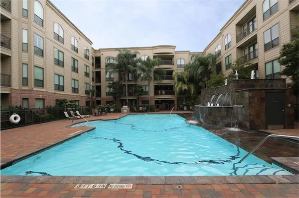 a view of yard with swimming pool