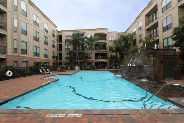 a view of yard with swimming pool