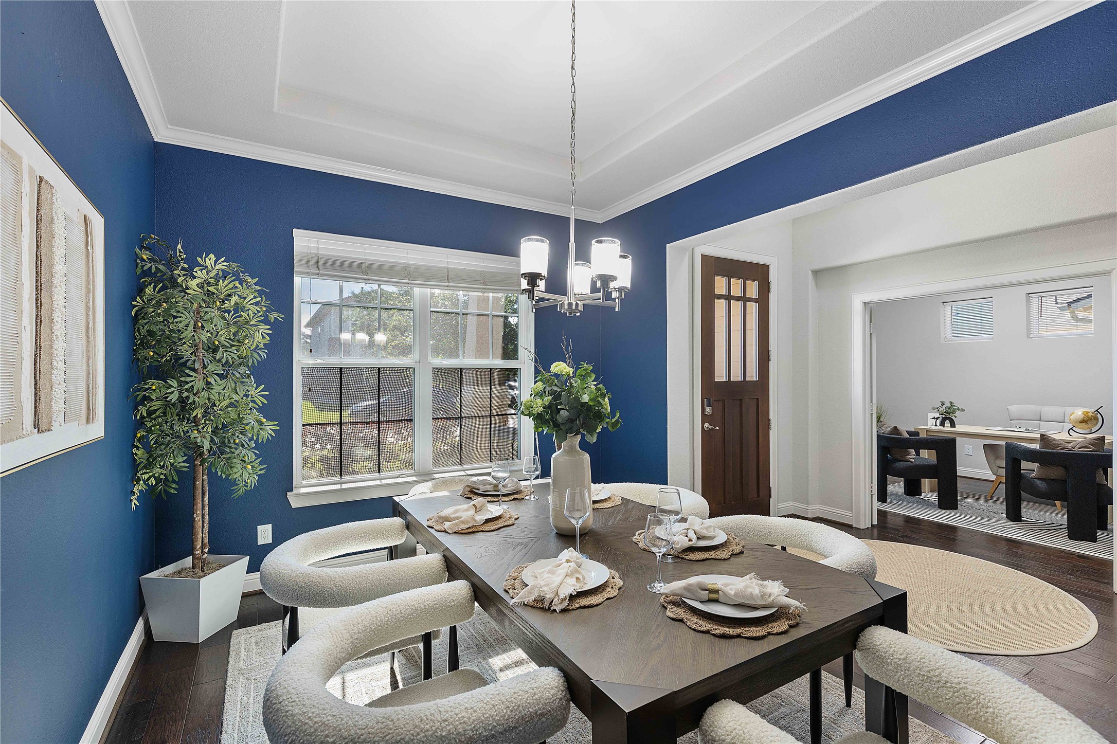 29539 Monona Terrace Court Spring, TX 77386 - Photo 6 of 50 The formal dining room is spacious with lots of natural light and perfect for entertaining. *Staged furniture and accessories do not convey with the home*