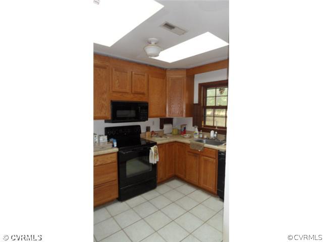 12141 Spring Run Road Chesterfield, VA 23832 - Photo 3 of 6 a kitchen with a sink cabinets and appliances