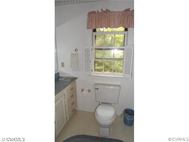 12141 Spring Run Road Chesterfield, VA 23832 - Photo 5 of 6 a bathroom with a toilet a sink and a window