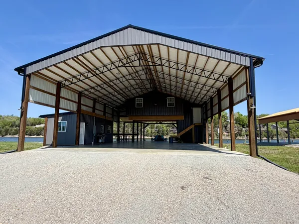 a view of swimming pool with an outdoor seating
