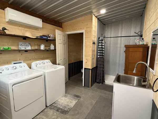 a kitchen with a refrigerator and a stove