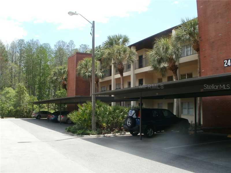 a front view of a building with garden