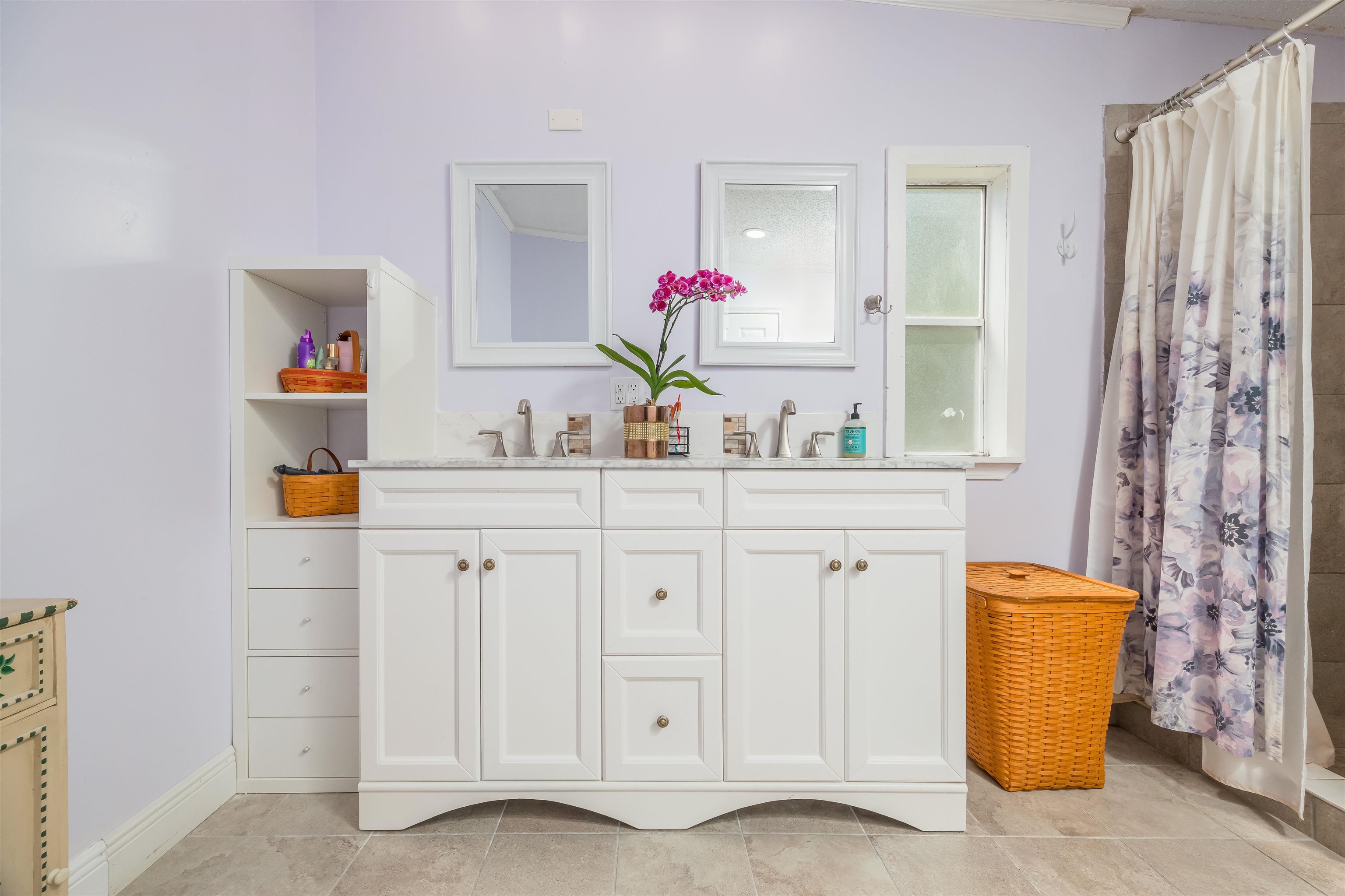 540 Stokes Landing Road St. Augustine, FL 32095 - Photo 19 of 77 a bathroom with a sink and a mirror