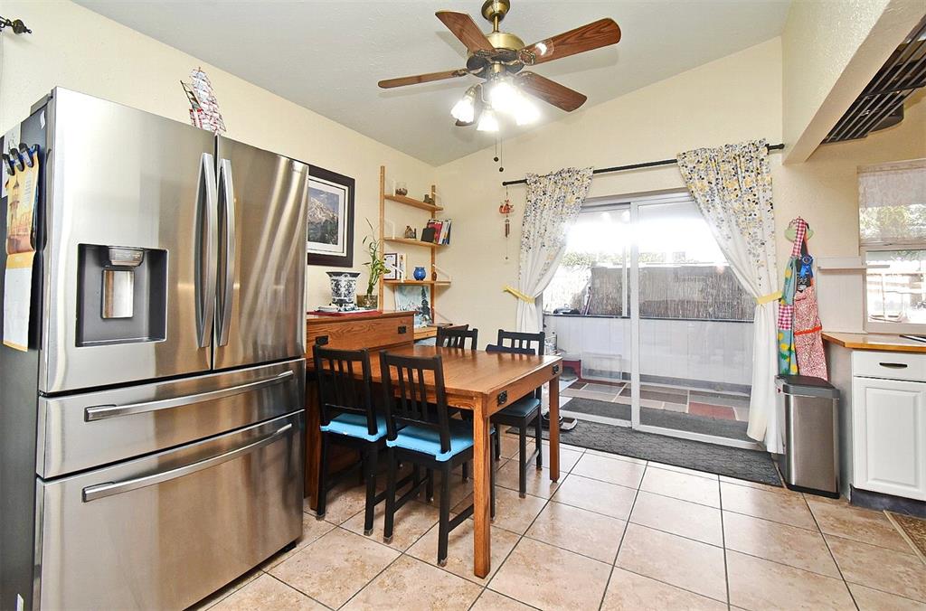 31 Chip Court Kissimmee, FL 34759 - Photo 30 of 37 a kitchen with stainless steel appliances granite countertop a refrigerator and a sink
