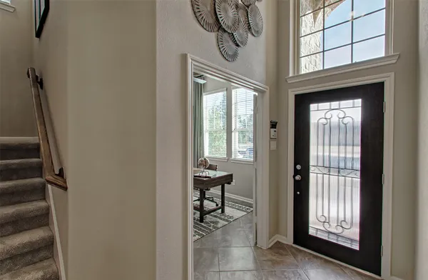 a view of entryway with a front door