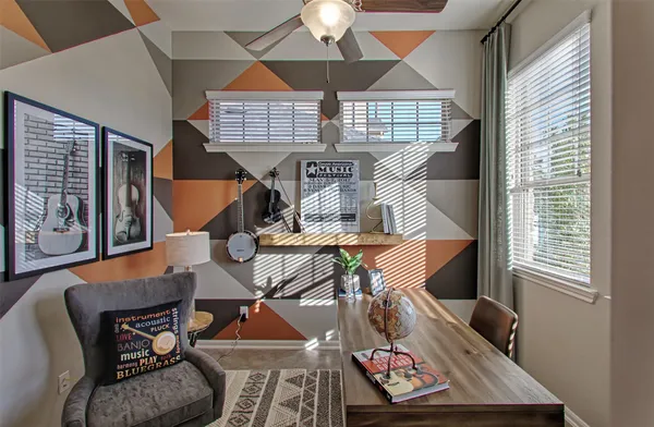 a living room with furniture and a window