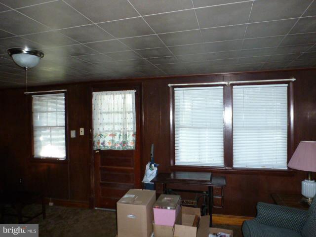 271 Fairview Road Gore, VA 22637 - Photo 3 of 29 a room with furniture and two window