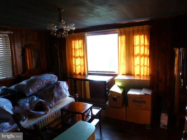 271 Fairview Road Gore, VA 22637 - Photo 7 of 29 a living room with furniture and a chandelier