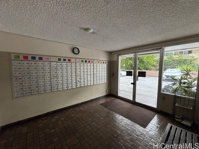 775 Kinalau Place, Unit 2008 Honolulu, HI 96813 - Photo 2 of 14 a view of an empty room with wooden floor and a window