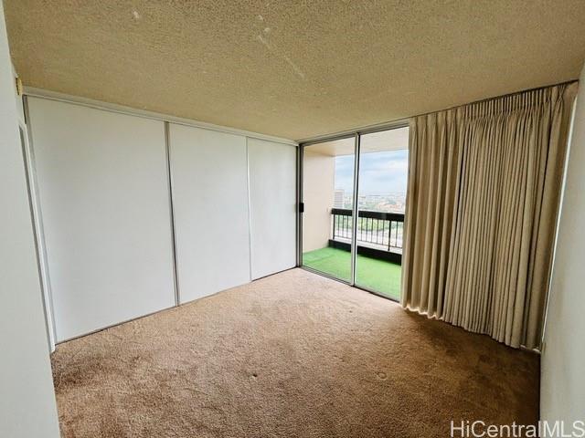 775 Kinalau Place, Unit 2008 Honolulu, HI 96813 - Photo 7 of 14 a view of a room with a staircase and a window