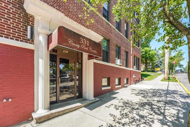 a view of a building with a street