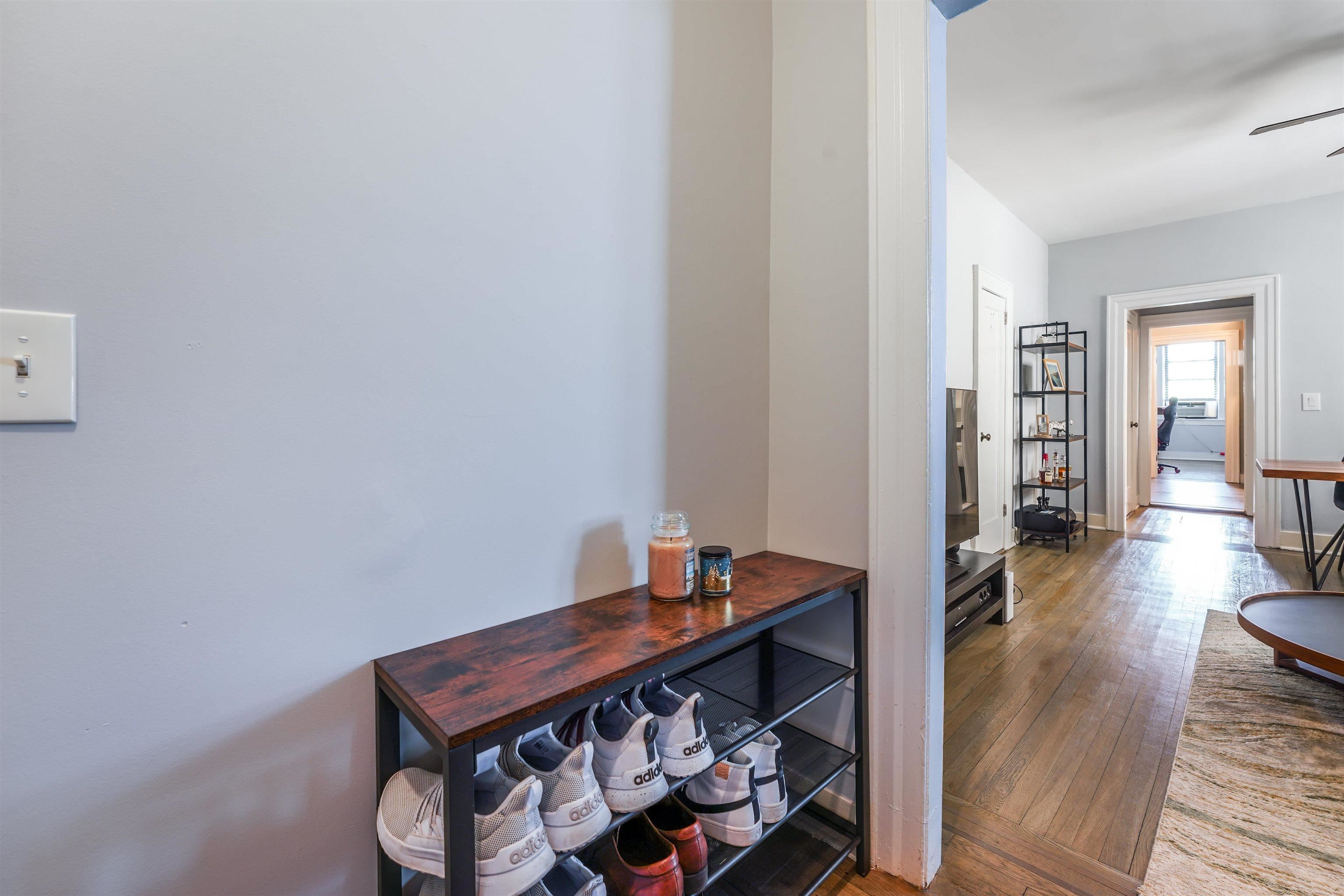 331 79th Street, Unit 53 North Bergen, NJ 07047 - Photo 3 of 14 a room with wooden floor and furniture