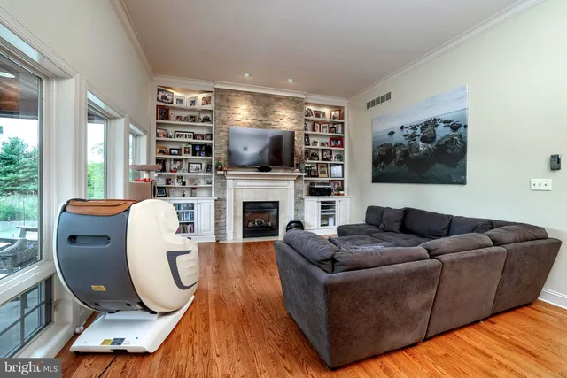 a bedroom with a large bed and a tv