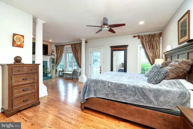 a bathroom with a shower sink and mirror