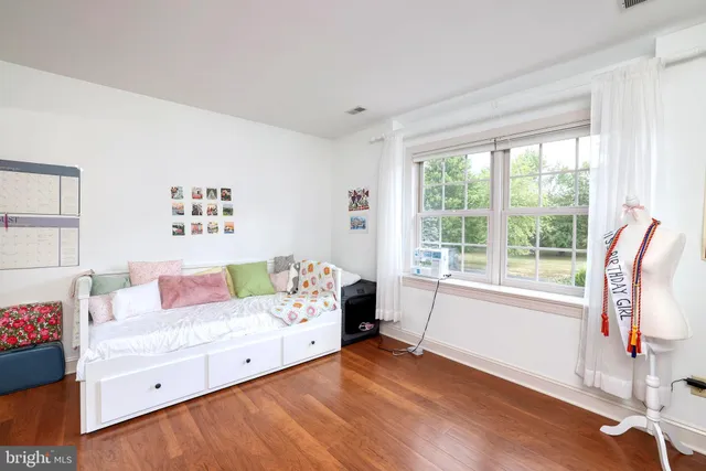 a en suite bathroom with a sink and a mirror