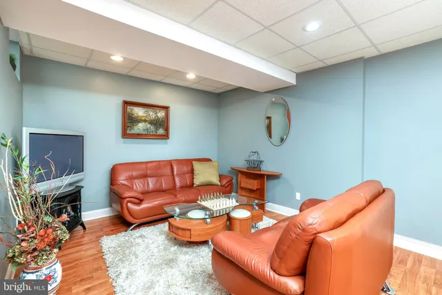 a bathroom with a double vanity sink a mirror and shower