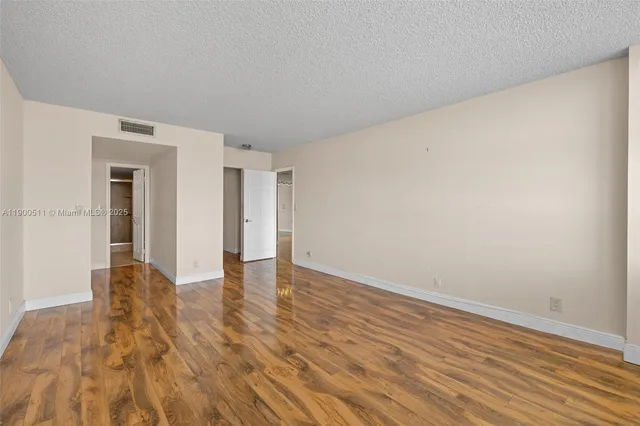 a view of wooden floor in a bathroom