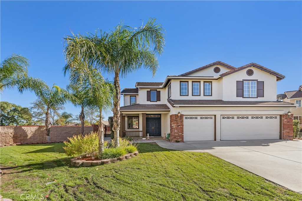 8974 Oakridge Court Riverside, CA 92508 - Photo 1 of 1 a front view of a house with a yard