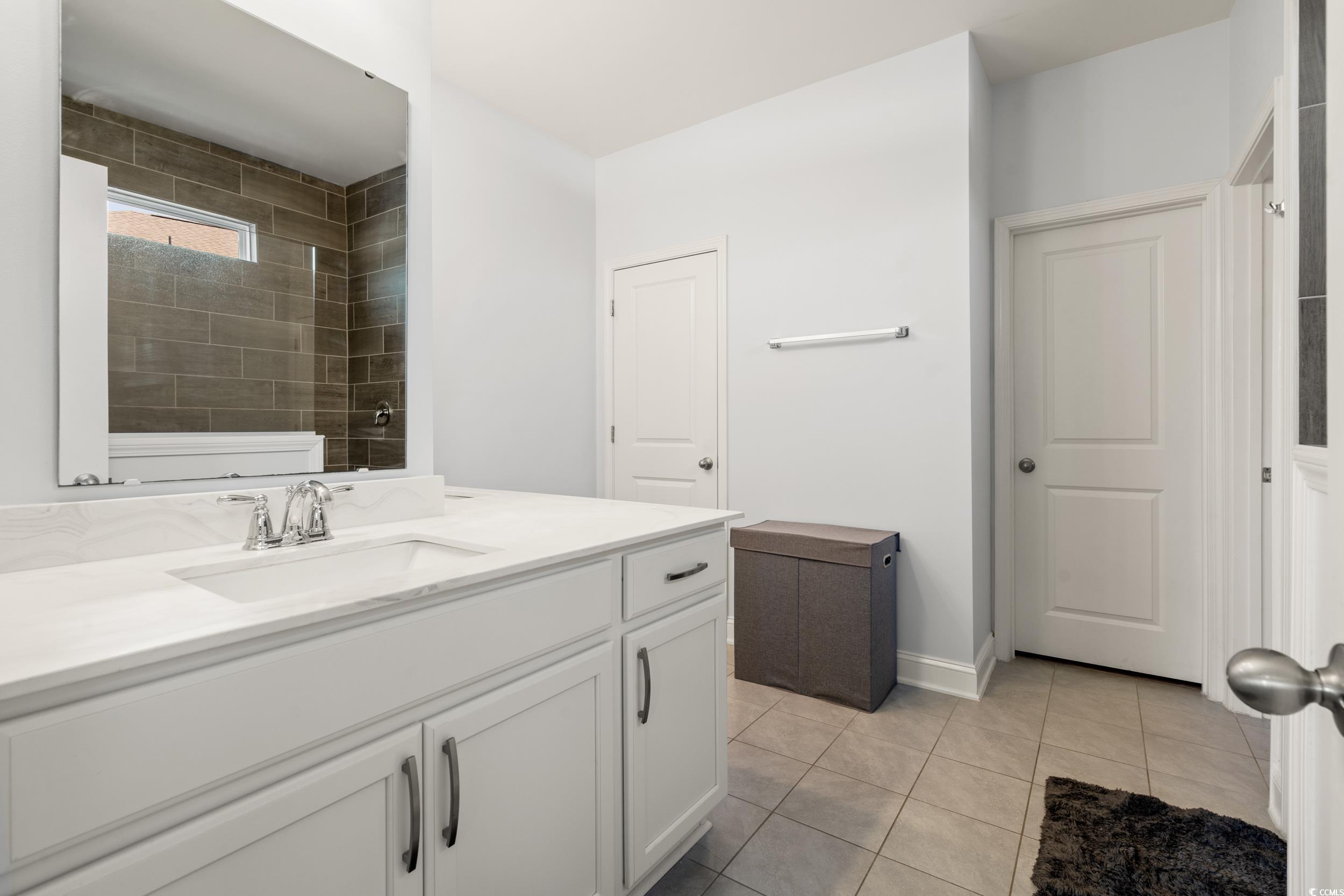 405 Spring View Little River, SC 29566 - Photo 14 of 40 Full bath with vanity and tile patterned floors