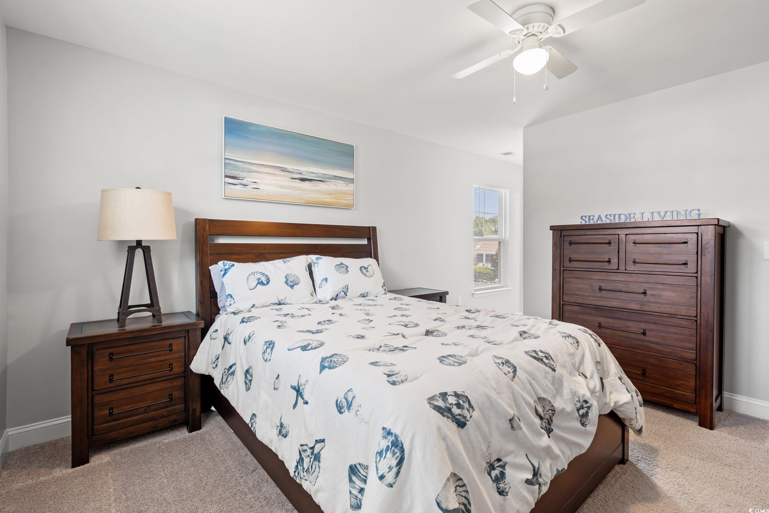 405 Spring View Little River, SC 29566 - Photo 22 of 40 Carpeted bedroom featuring baseboards and ceiling fan