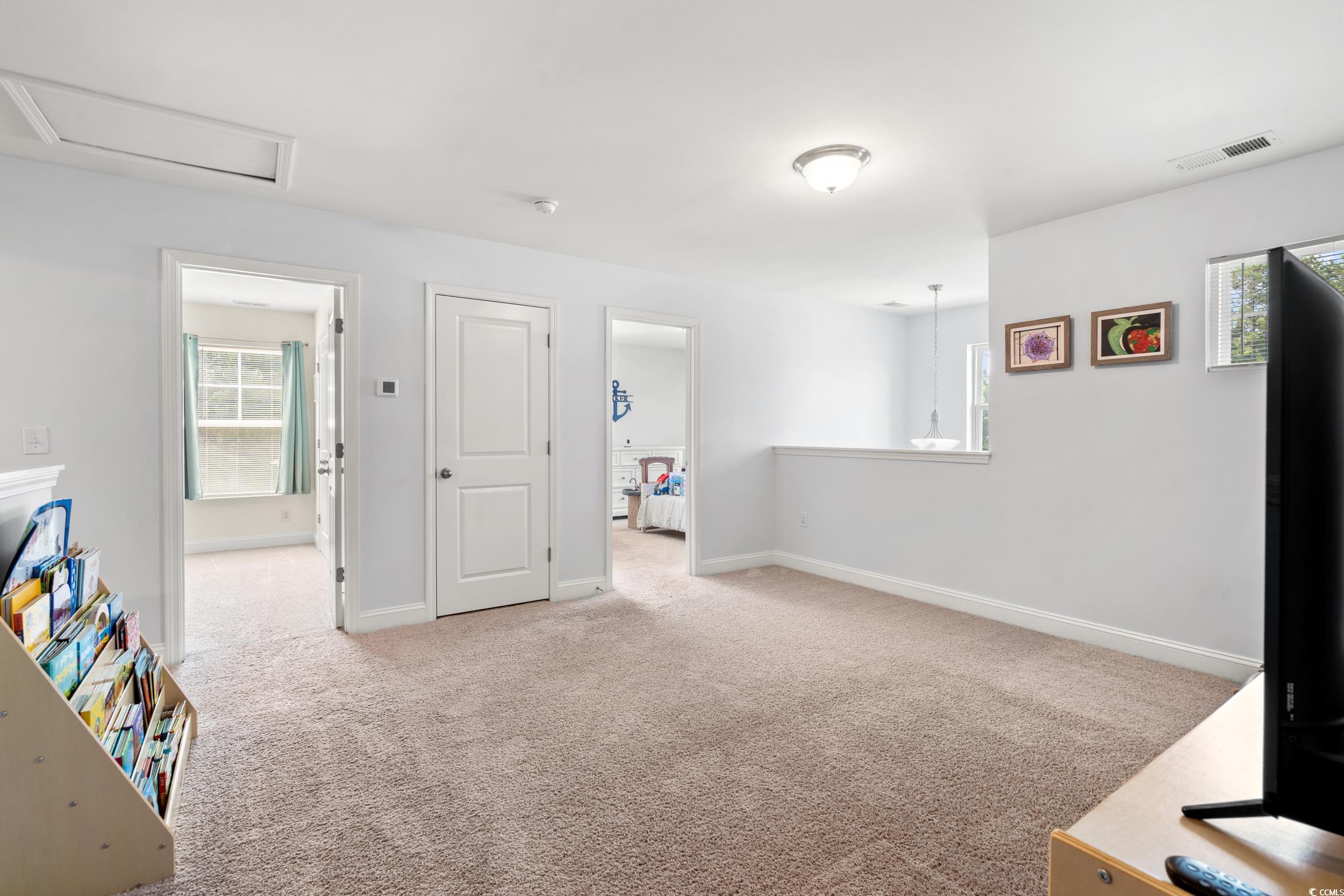 405 Spring View Little River, SC 29566 - Photo 27 of 40 Playroom featuring light colored carpet and baseboards