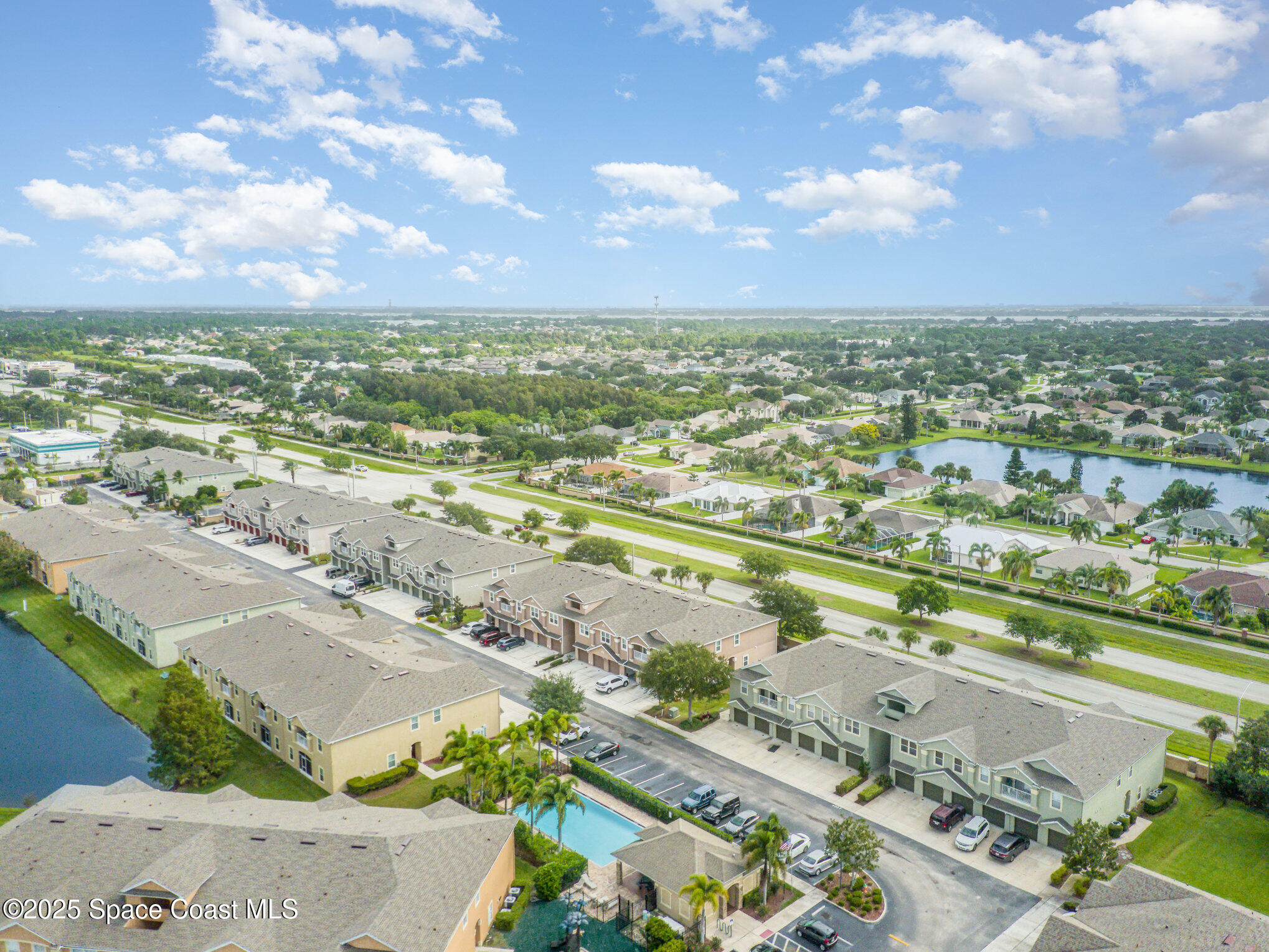 4017 Meander Place, Unit 103 Rockledge, FL 32955 - Photo 2 of 10 an aerial view of beach and city
