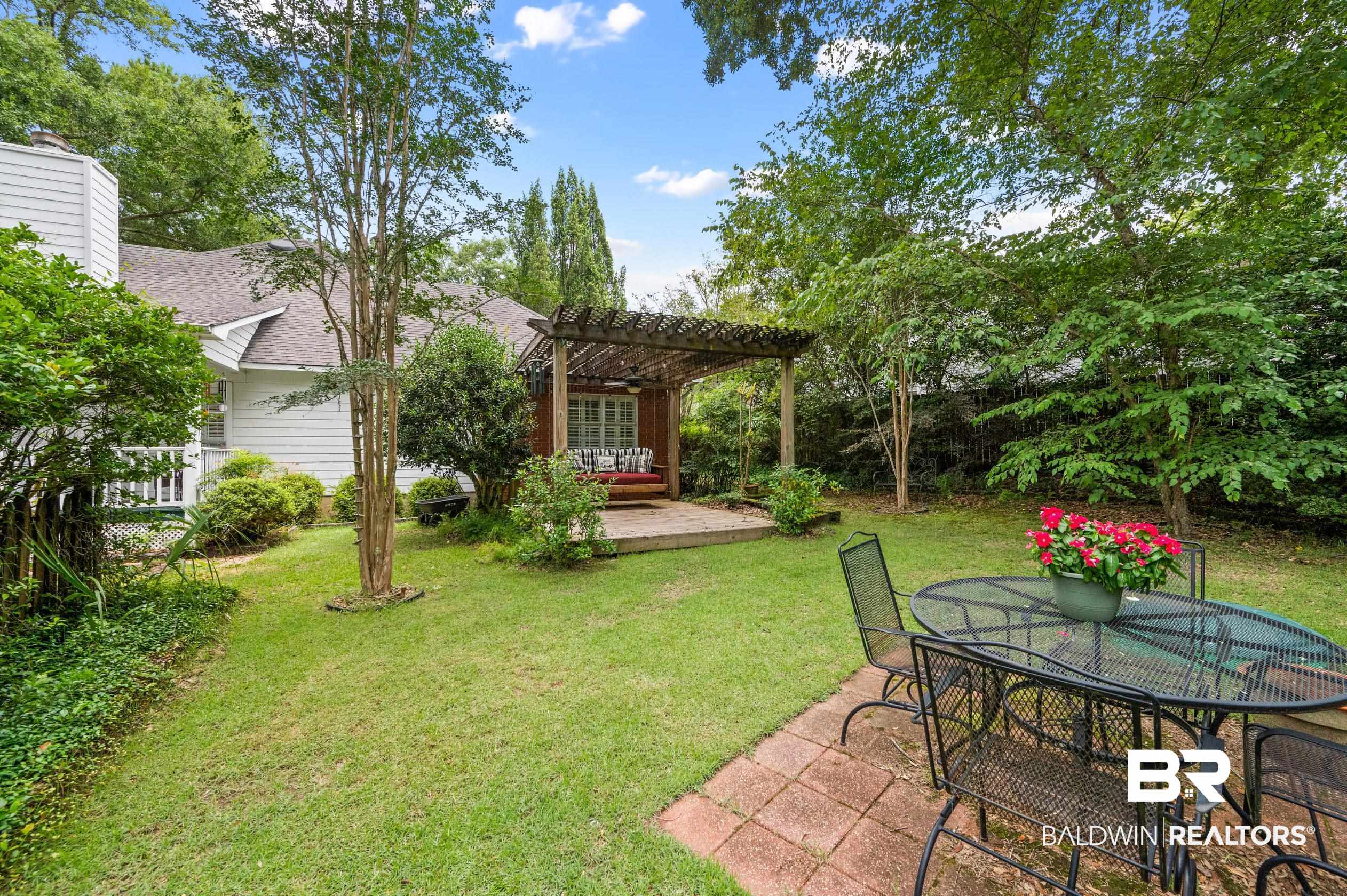 6638 Jackson Square Daphne, AL 36526 - Photo 33 of 62 View of yard featuring a pergola and a patio area