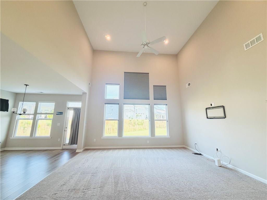 607 Michigan Circle Hoschton, GA 30548 - Photo 11 of 27 a view of an empty room with a window