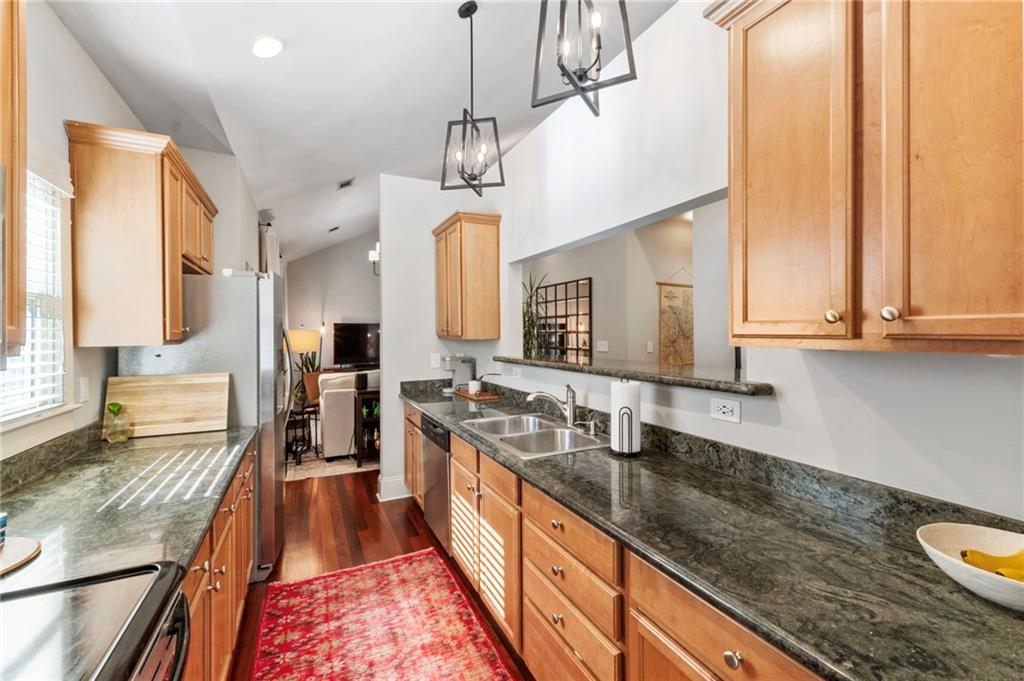 173 Berean Avenue Southeast Atlanta, GA 30316 - Photo 23 of 61 a large kitchen with stainless steel appliances a counter space a sink and a window