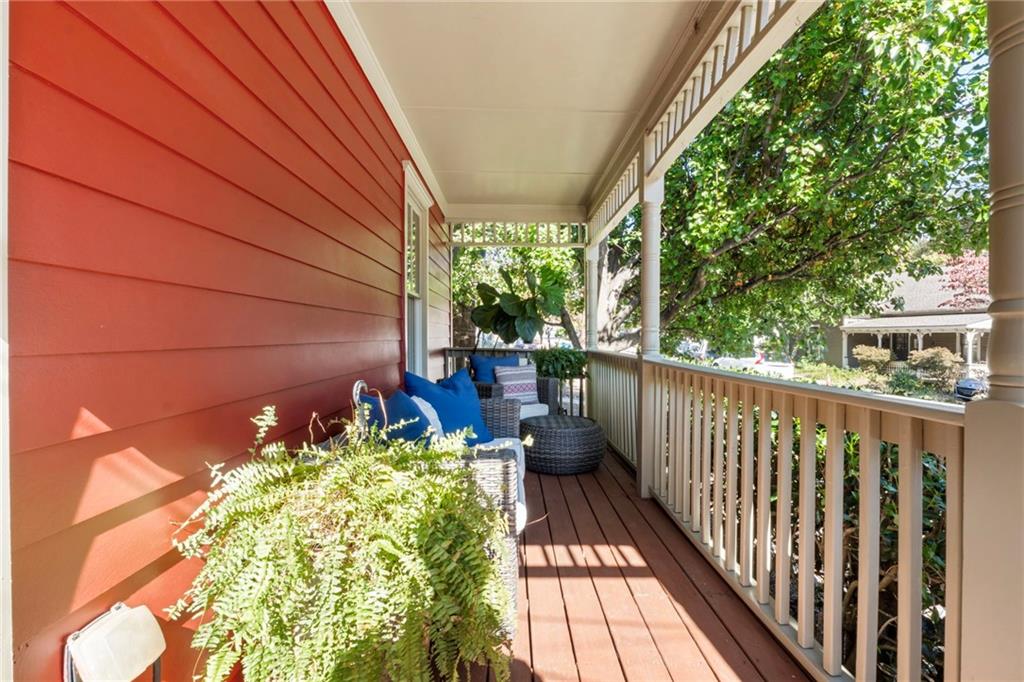 173 Berean Avenue Southeast Atlanta, GA 30316 - Photo 7 of 61 a balcony with wooden floor