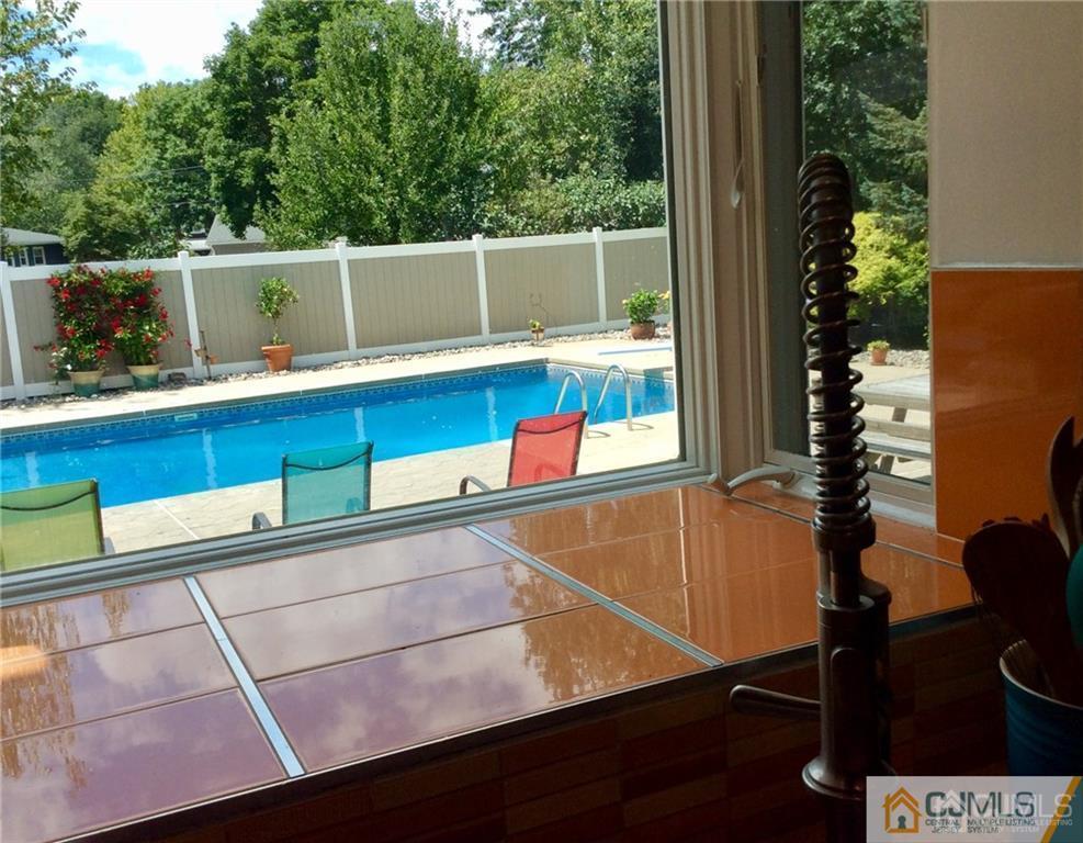 24 Rath Lane East Brunswick, NJ 08816 - Photo 11 of 25 a view of outdoor space with seating area