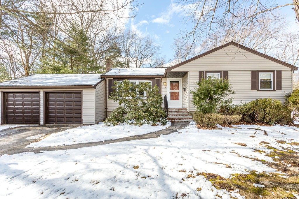 7 Hampton Road Sharon, MA 02067 - Photo 1 of 18 a front view of a house with a yard and garage