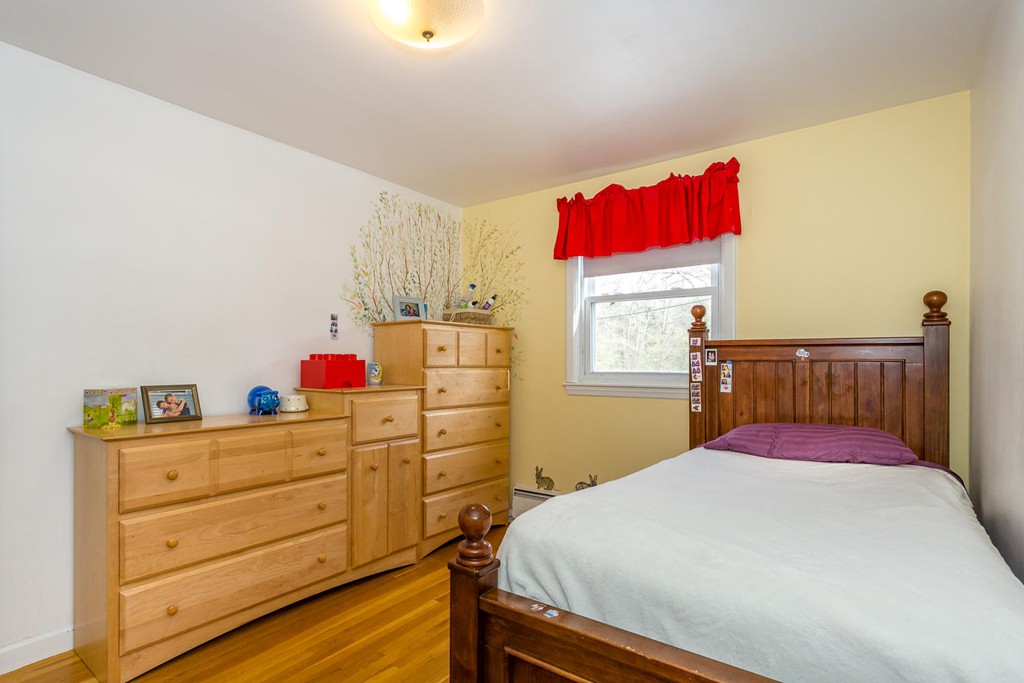 7 Hampton Road Sharon, MA 02067 - Photo 11 of 18 a bedroom with a bed and closet