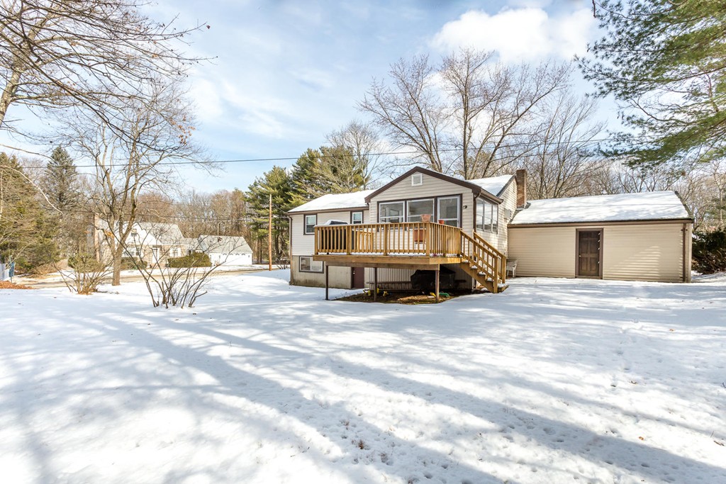 7 Hampton Road Sharon, MA 02067 - Photo 16 of 18 a view of a house with a yard covered in snow