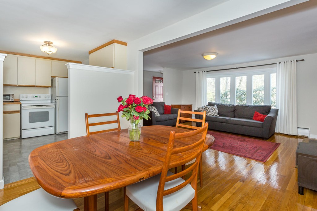 7 Hampton Road Sharon, MA 02067 - Photo 6 of 18 a living room with furniture and a kitchen
