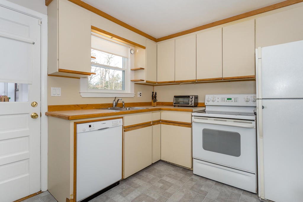7 Hampton Road Sharon, MA 02067 - Photo 7 of 18 a kitchen with appliances cabinets and a sink