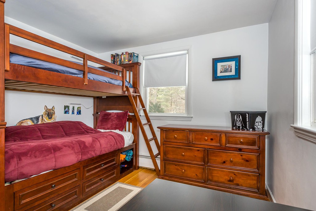 7 Hampton Road Sharon, MA 02067 - Photo 10 of 18 a bed room with a bed and a window