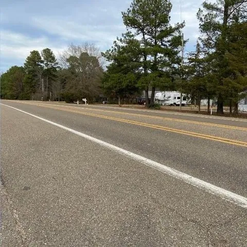 a view of a building with a street