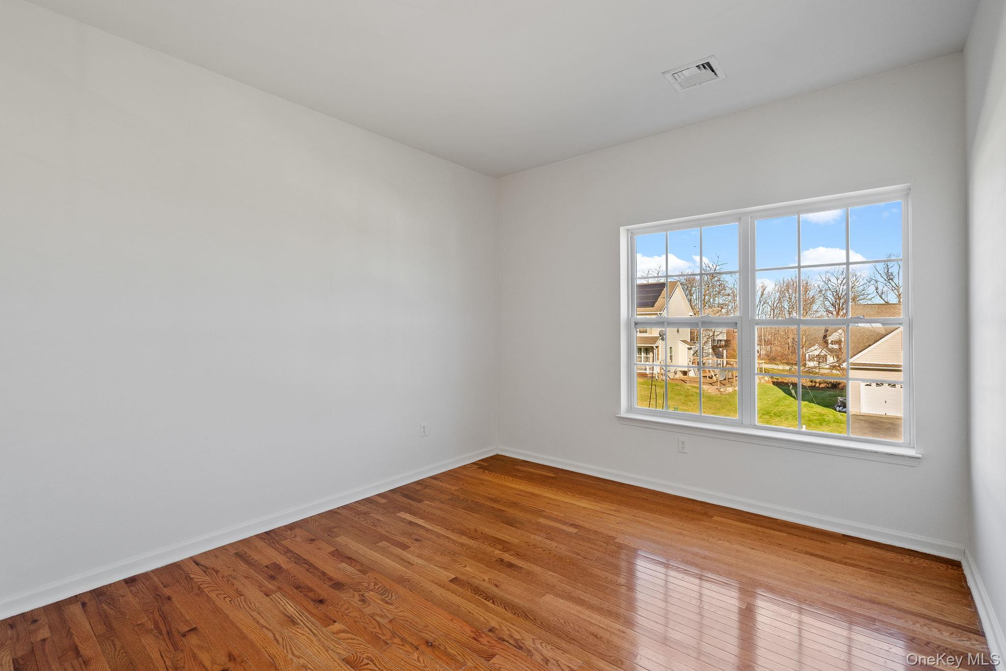 17 Carmella Road Highland, NY 12528 - Photo 21 of 48 Spare room with hardwood / wood-style floors and baseboards