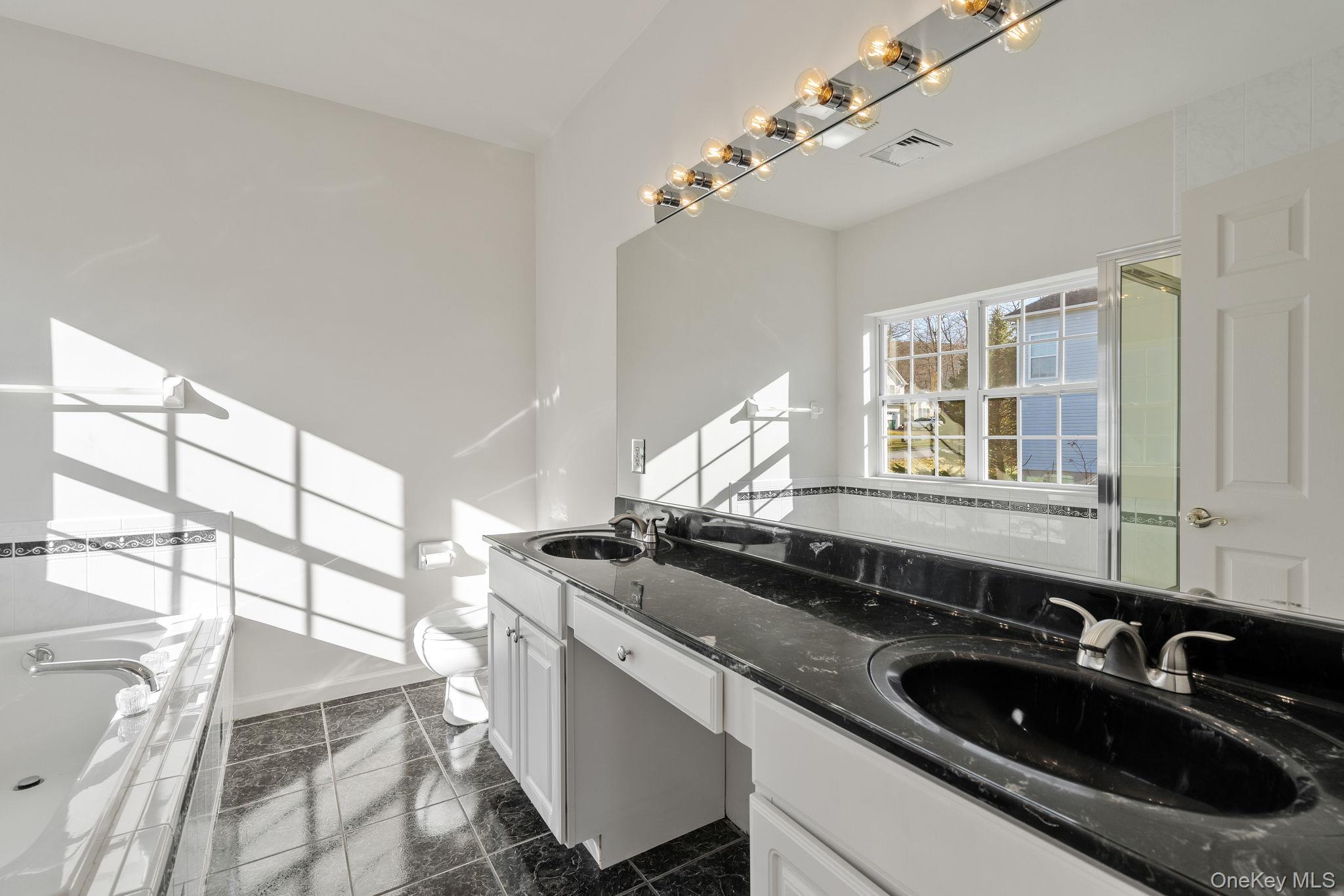 17 Carmella Road Highland, NY 12528 - Photo 30 of 48 Full bath featuring a bath and double vanity